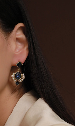 相惜。垂式耳環