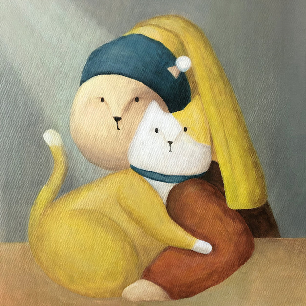 珍珠耳環的少女與她的貓
