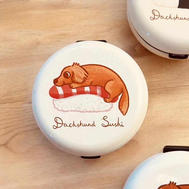 A.棕色臘腸鮭魚握壽司