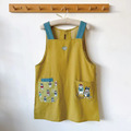 Kusuguru 刺繡露西保羅後扣圍裙(兩色可選)