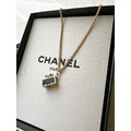 CHANEL 淡金色黑釉CC LOGO 珍珠輪胎超Q車墜飾 客訂項鍊_2