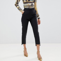 個性街頭風 褲腳前短後長修身七分褲