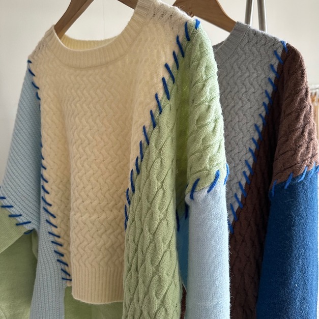 日系縫線拼接前短後長上衣