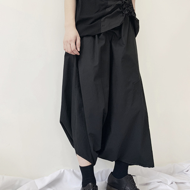 挺料解構不對稱褲管低襠造型褲