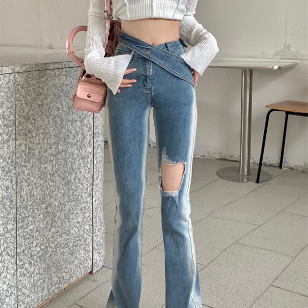 C052-434 破洞邊邊刷色微喇牛長褲