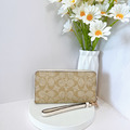COACH 老花拉鍊長夾 白咖_2
