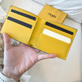 FENDI 八卡短夾 黑拼接黃_1
