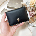BVLGARI 蛇頭對開 卡夾 素面黑_1