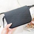 GUCCI GG滿版壓印斜背包_1