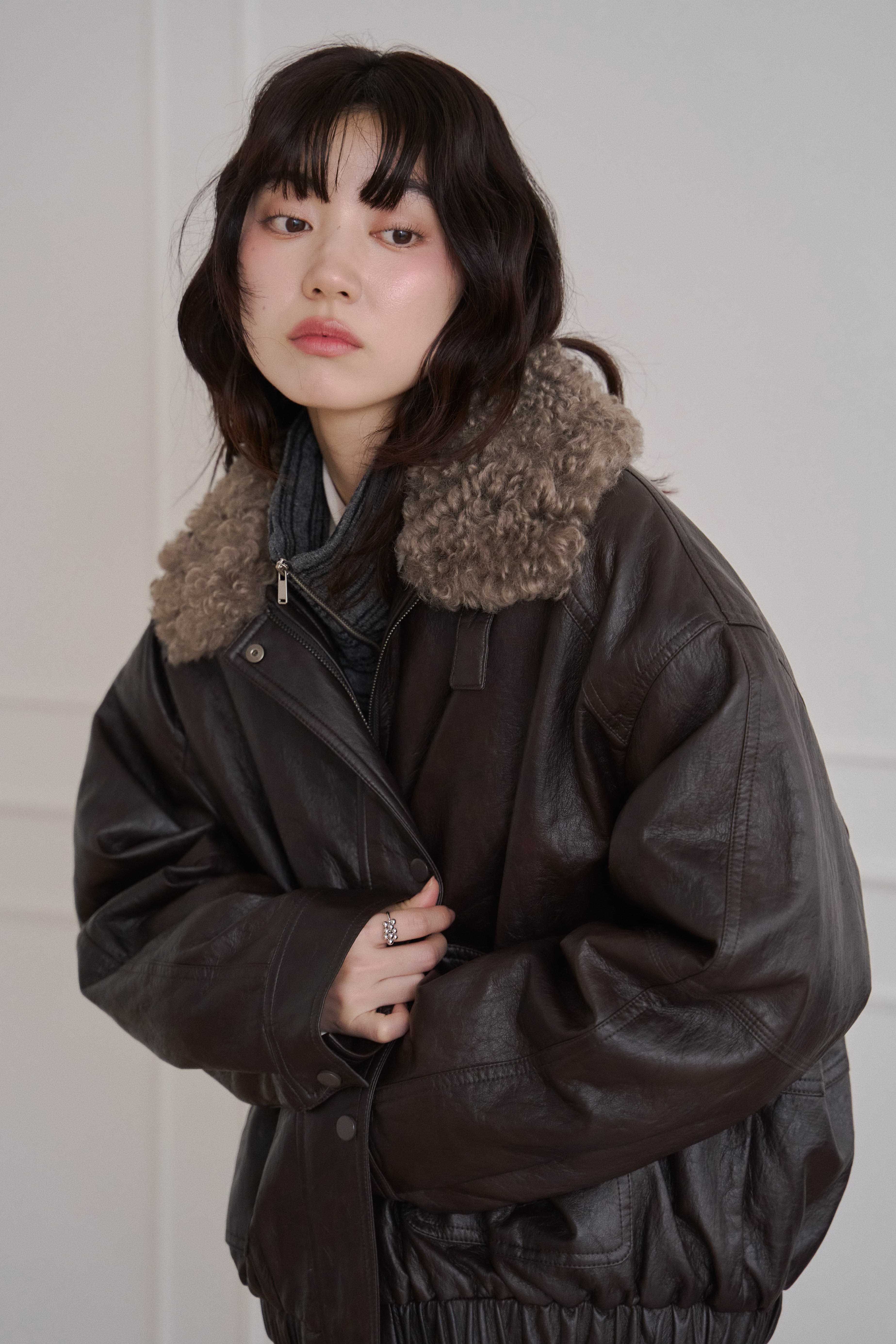 捲捲毛拼接皮革外套