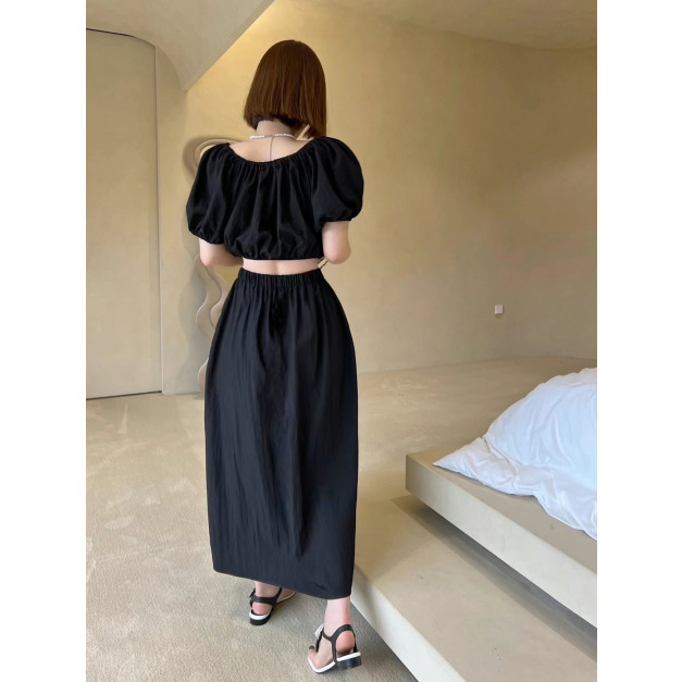 設計款一字領性感露腰長洋