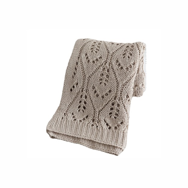 米色針織蓋毯