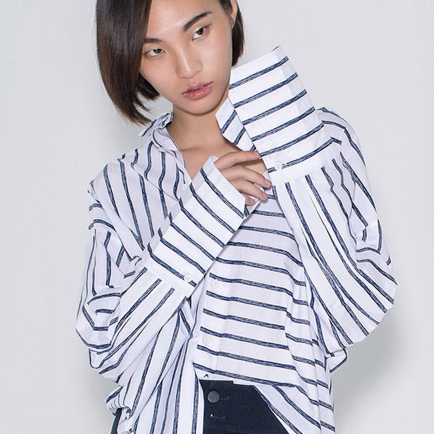 長袖口，不規則剪裁襯衫