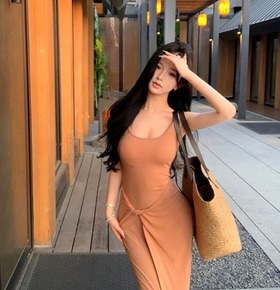 性感細肩扭結包臀長洋
