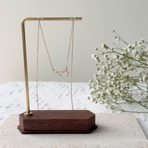 不對稱鏤空心紋珍珠項鍊