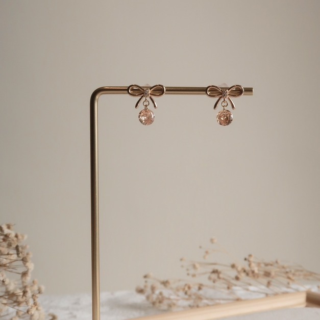 (闆娘最愛)蝴蝶結香檳粉橘裸鑽鋯石耳環